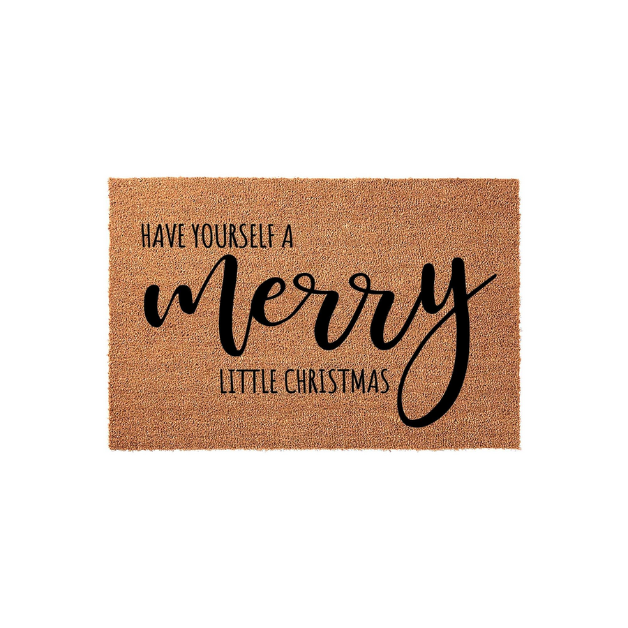 Have Yourself a Merry Little Christmas coir doormat featuring a natural brown fiber texture and bold black typography, creating a festive holiday entryway decor piece that welcomes guests to your home during the winter season.