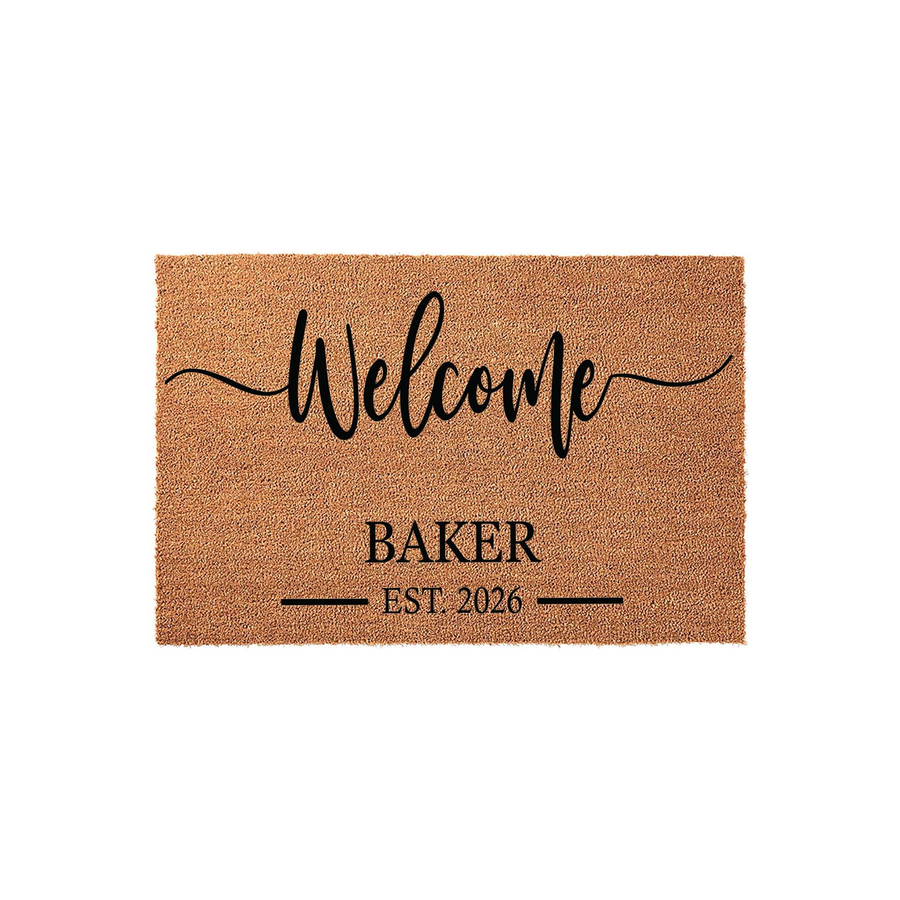 Personalized coir welcome doormat featuring a natural tan fiber texture with black script text that says Welcome, followed by a custom family name and an established year date on a clean white background.