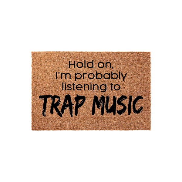 Funny Trap Music Doormat featuring a natural coir texture with bold black text that reads Hold on, I am probably listening to TRAP MUSIC, making it a humorous and stylish welcome mat for any music lover's front porch or entryway.