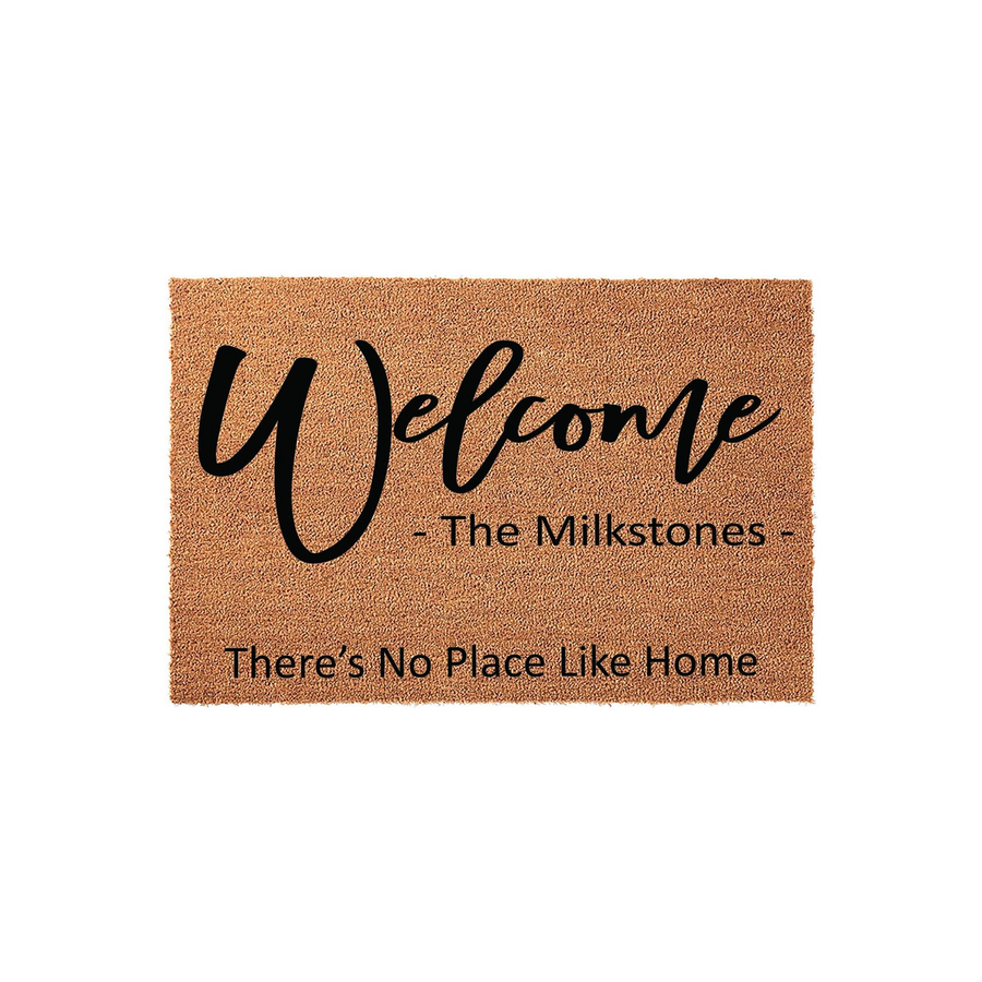 Personalized family name doormat featuring a natural coir texture with the word Welcome in elegant black script, followed by a custom family name and the phrase There is No Place Like Home printed in a clean, modern sans-serif