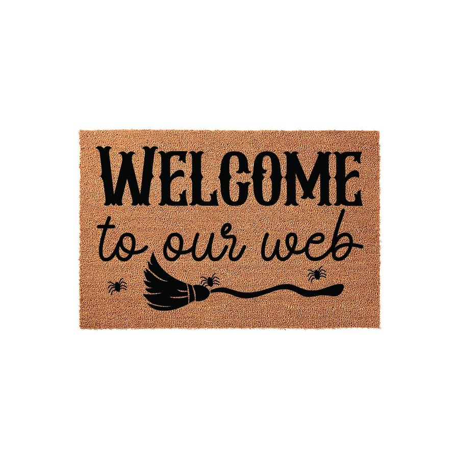 Halloween Welcome to Our Web doormat featuring a natural coir texture with black text and a witch broom graphic, creating a festive seasonal entryway decor piece that adds a spooky touch to your front porch for the autumn holiday