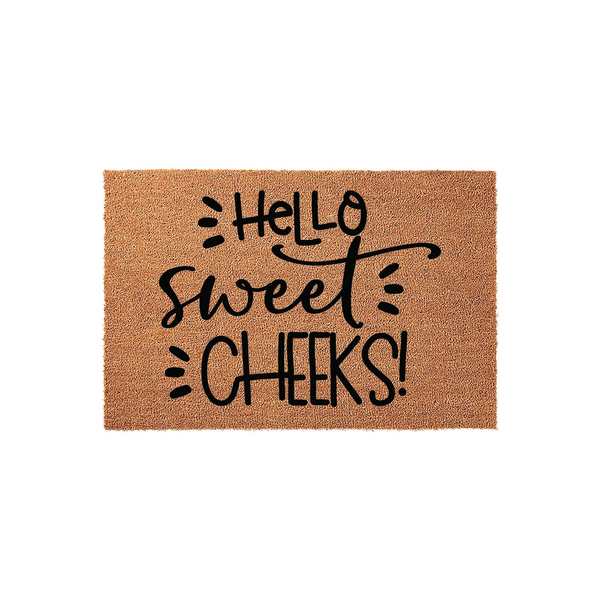 Hello Sweet Cheeks coir doormat featuring a natural tan fiber texture and bold black hand-lettered typography, providing a fun and welcoming entrance decor piece for your front porch or home entryway on a clean white background.