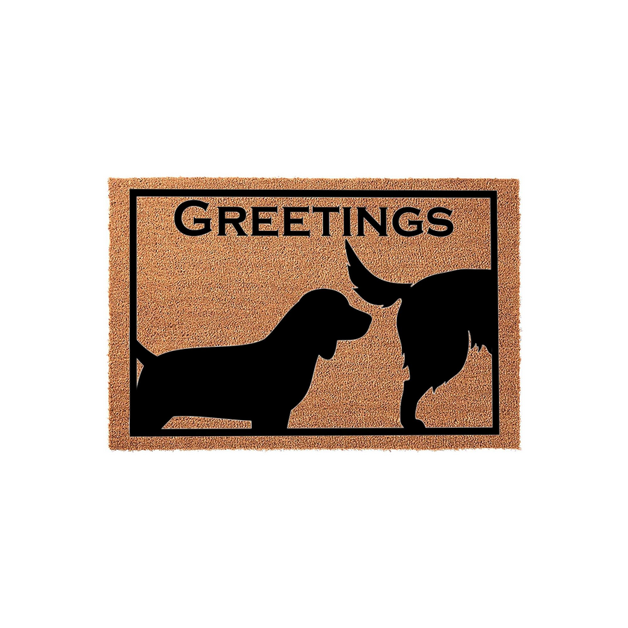 Dog Greetings Coir Doormat featuring a humorous black silhouette of two dogs sniffing each other, set against a natural brown coconut fiber background with a bold black border and the word Greetings printed in a clean sans-serif