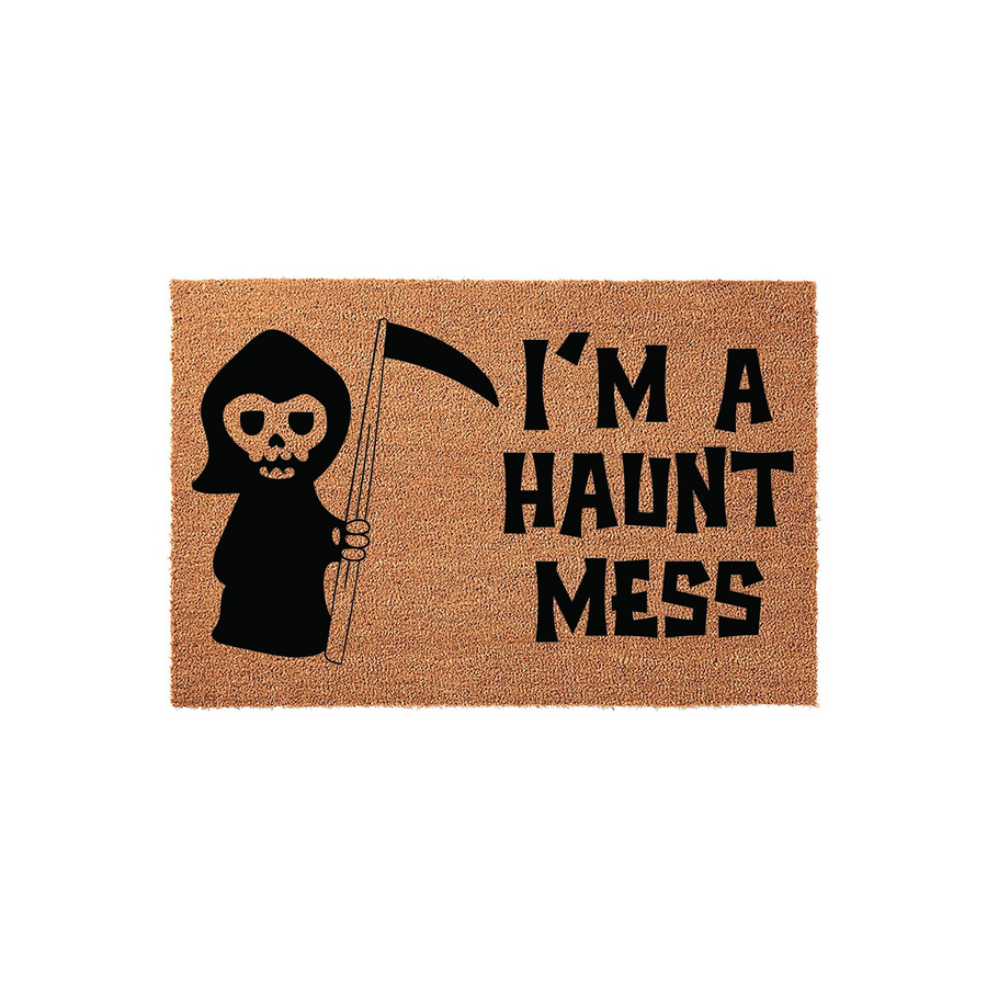 Funny Halloween Doormat featuring a cute cartoon grim reaper holding a scythe and the text I'm A Haunt Mess printed in bold black letters on a natural coir fiber background, perfect for seasonal front porch decor and spooky home