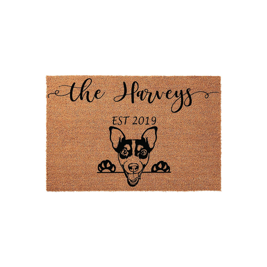 Personalized Rat Terrier doormat featuring a cute dog peeking over a line, customized with a family name and established year on a natural coir fiber background, making a welcoming entrance for any dog lover home.