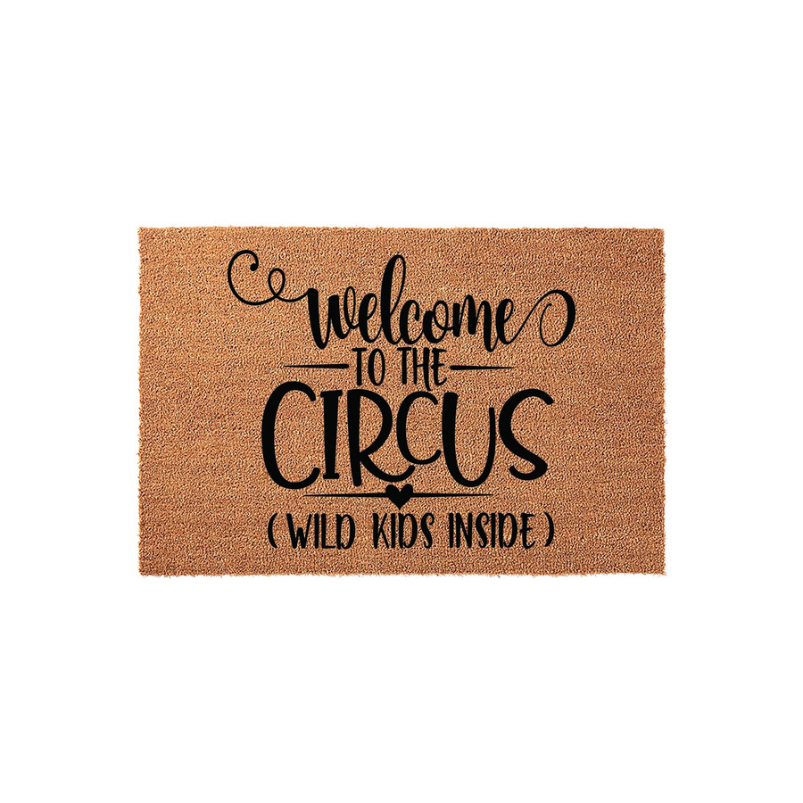 Welcome to the Circus Wild Kids Inside coir doormat featuring a natural tan fiber texture and bold black typography, perfect for a fun entryway that highlights the chaotic and playful energy of a busy family home with children.