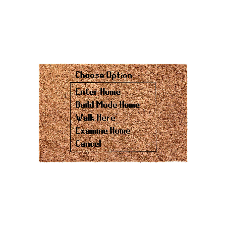 Video Game Themed Coir Doormat featuring a pixelated menu interface with options like Enter Home, Build Mode Home, and Walk Here, set against a natural brown fiber background that adds a fun, nostalgic touch to any gamer front
