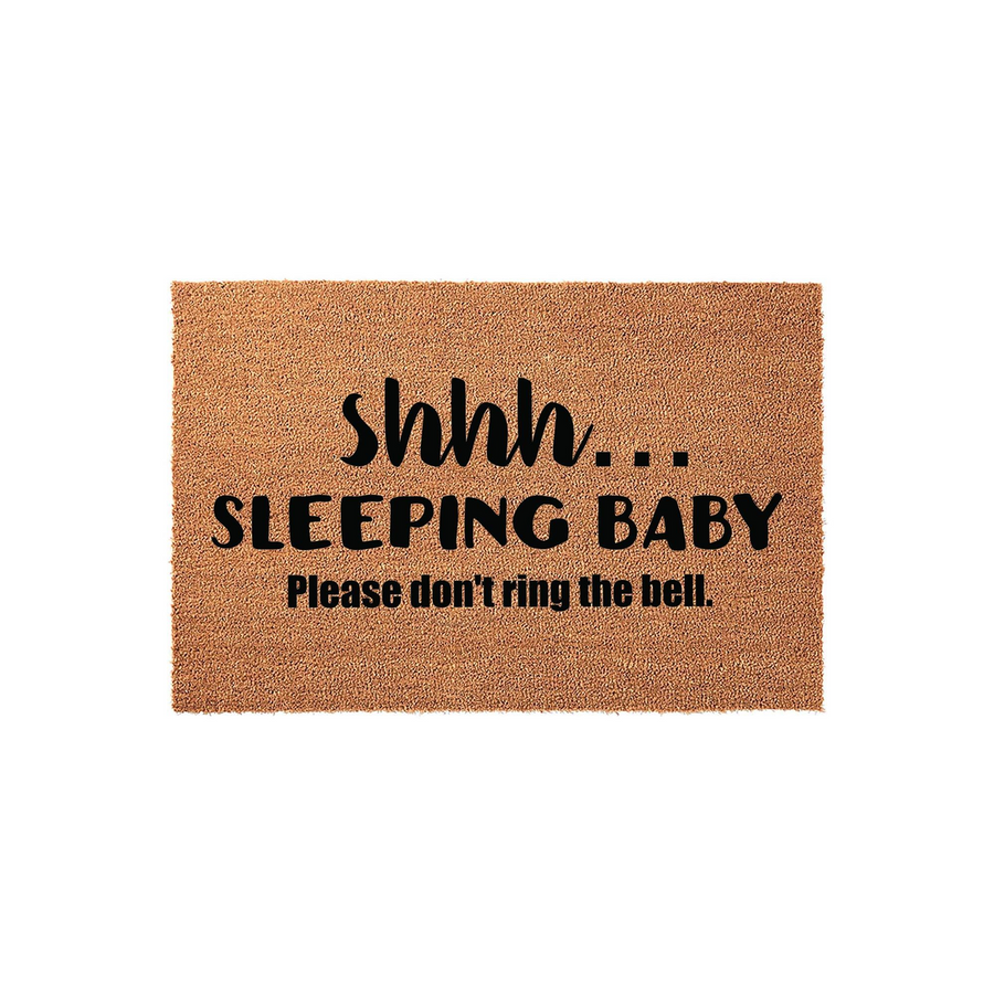 Shhh Sleeping Baby doormat made of natural coir fiber with a rustic texture, featuring bold black text that reads shhh... SLEEPING BABY Please don't ring the bell, perfect for a front porch to alert visitors to a quiet home