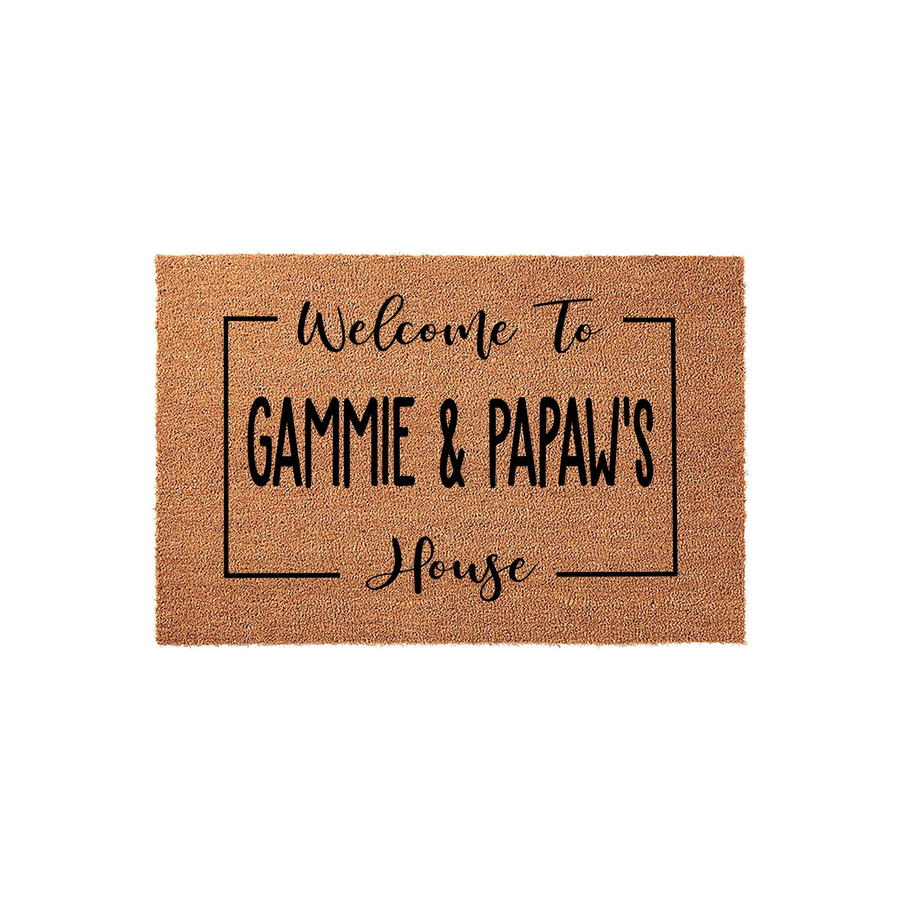 Personalized Gammie and Papaw coir doormat featuring a natural tan fiber texture and black printed text that reads Welcome To Gammie and Papaw's House, framed by a simple rectangular border on a clean white studio background.