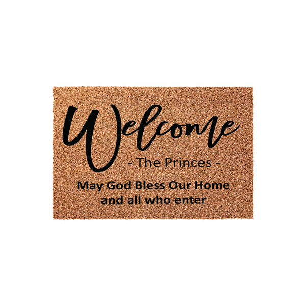 Personalized coir welcome doormat featuring the word Welcome in elegant script, a custom family name, and the religious phrase May God Bless Our Home and all who enter printed in black ink on a natural brown textured fiber