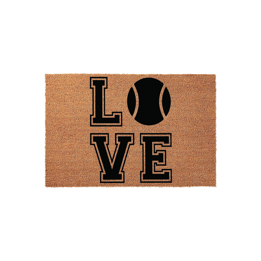 Tennis Love Coir Doormat featuring a natural brown fiber texture with the word LOVE printed in bold black block letters, where the letter O is replaced by a detailed black tennis ball graphic on a clean white studio background.