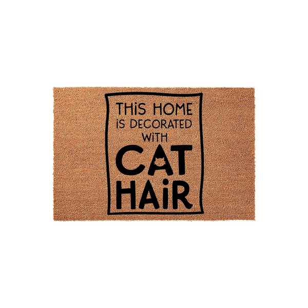 Cat Hair Welcome Doormat featuring a natural coir texture with a black printed design that reads This Home Is Decorated With Cat Hair, making it a humorous and functional entryway rug for any cat lover's home decor.