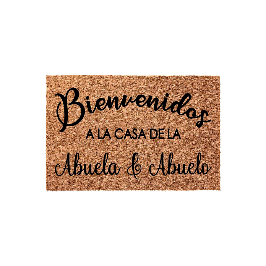 Abuela and Abuelo welcome doormat featuring natural coir fiber texture and black script lettering that reads Bienvenidos a la casa de la Abuela y Abuelo, making a warm and inviting entrance piece for a grandparent's home front