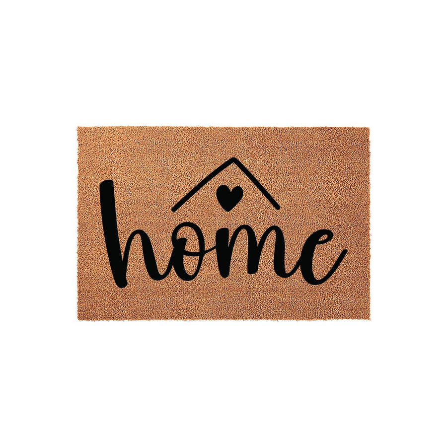 Home coir doormat featuring a rustic brown natural fiber texture with the word home printed in bold black script, where the letter o is replaced by a small heart icon and a simple roof outline sits above the text for a farmhouse