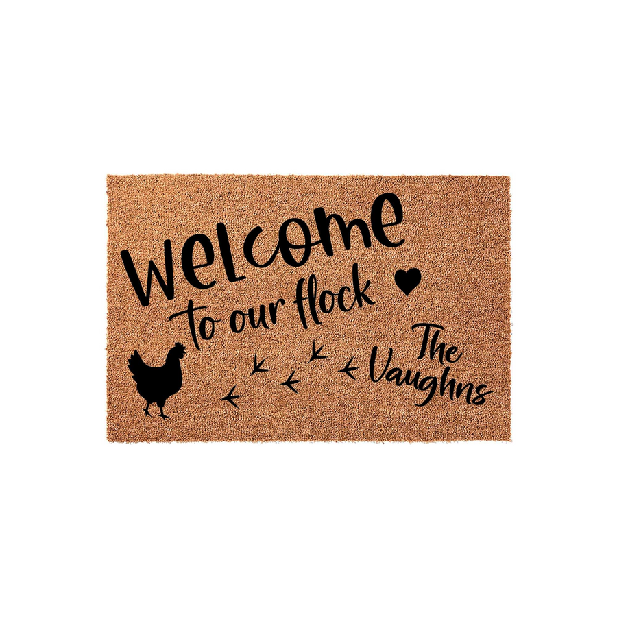 Personalized Chicken Welcome Doormat featuring a natural coir texture with black printed text that reads Welcome to our flock, a silhouette of a hen, small chicken footprints, and a space for a custom family name on a plain white