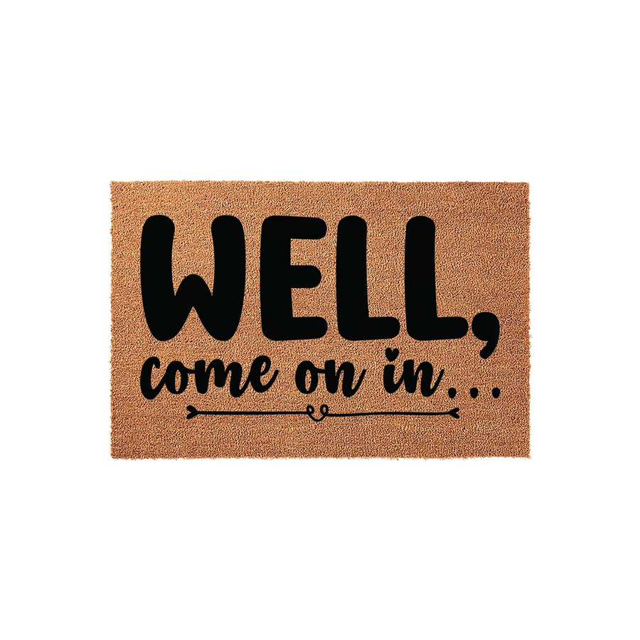 Well, Come On In Coir Doormat featuring a natural brown fiber texture with bold black lettering that reads Well, come on in, accented by a decorative arrow graphic at the bottom for a welcoming touch to your front porch entryway