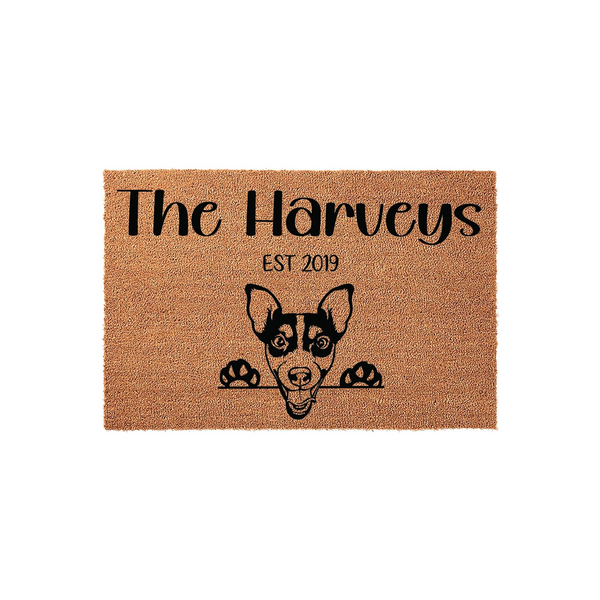 Personalized Rat Terrier doormat featuring a cute dog peeking over the edge, customized with a family name and established year on a natural coir fiber background for a welcoming front porch entrance that celebrates your pet.