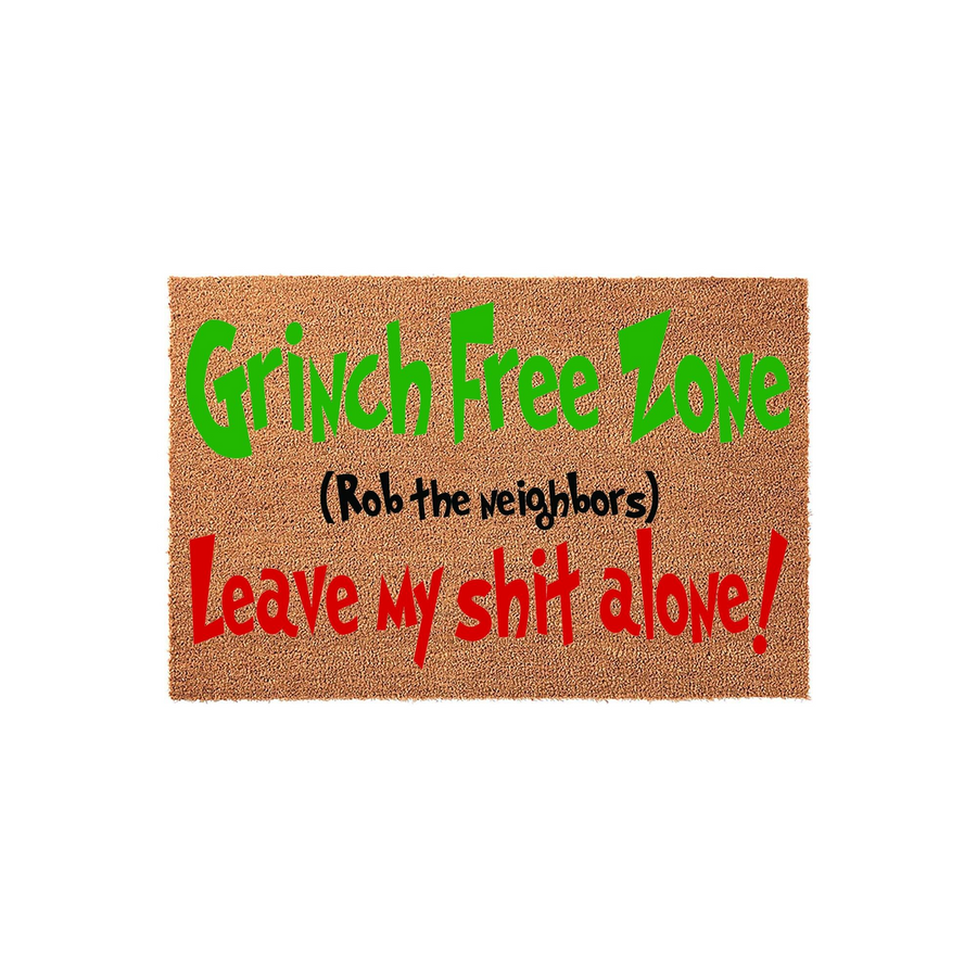 Funny Grinch Free Zone coir doormat featuring bold green and red text on a natural brown fiber background, with a humorous message telling visitors to rob the neighbors instead of the home, perfect for a festive holiday front