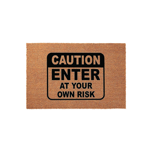 Caution Enter At Your Own Risk doormat featuring a textured brown coir surface and a bold black sign graphic in the center, providing a humorous and warning-style welcome for guests at your front door or home entryway.