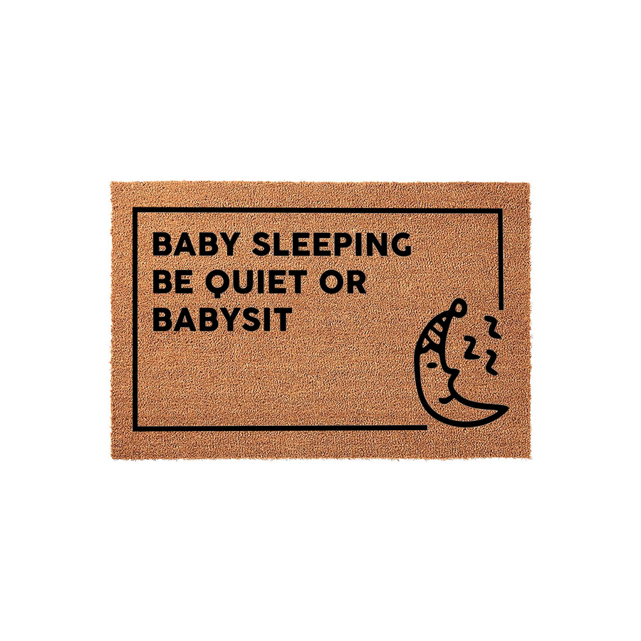 Baby Sleeping Be Quiet Or Babysit coir doormat featuring a humorous message and a cute sleeping moon graphic, set against a plain white background to highlight the natural fiber texture and bold black lettering for a nursery
