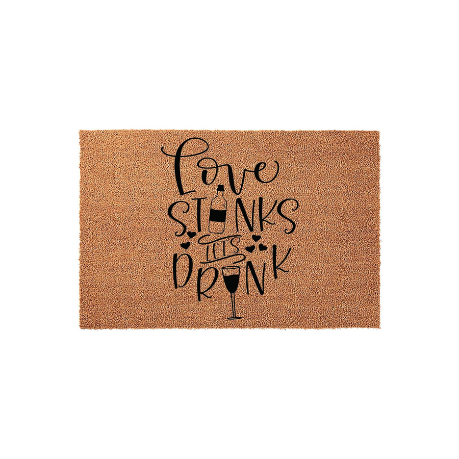 Love Stinks Lets Drink coir doormat featuring a humorous wine-themed design with black text and illustrations of a wine bottle and glass on a natural brown textured fiber background, perfect for a fun home entryway or porch decor.