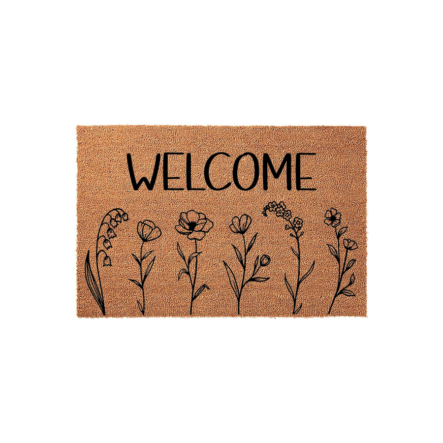 Floral Welcome Doormat featuring a natural coir texture with a black ink design of wildflowers and the word Welcome printed in a clean, modern font, creating a charming and inviting entryway accent for any home front porch or