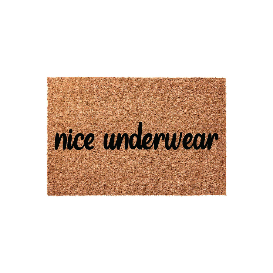 Funny Nice Underwear doormat featuring bold black cursive lettering printed on a natural tan coir fiber mat, providing a humorous and welcoming touch to your front porch entryway decor for guests arriving at your home.