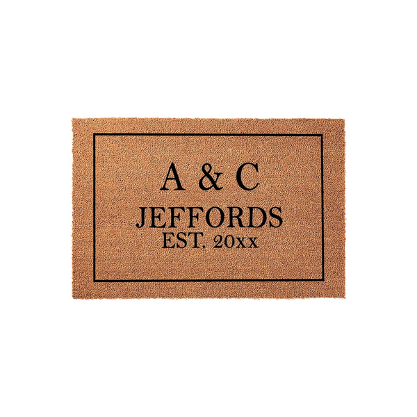 Personalized Family Name Coir Doormat featuring a classic black border and custom text that includes initials, a last name, and an established year, presented on a natural tan textured coir fiber background for a welcoming home