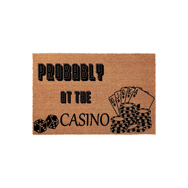 Probably At The Casino doormat featuring a natural coir texture with black printed graphics of playing cards, poker chips, and dice, making it a fun front porch decor piece for anyone who loves gambling, card games, and casino