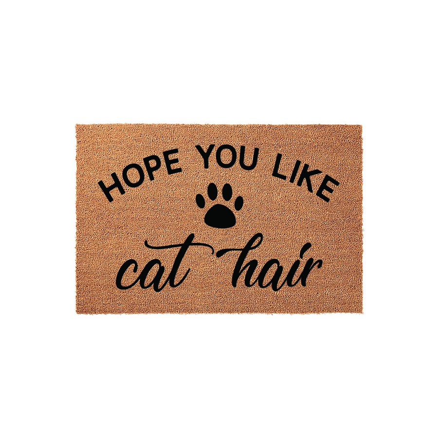 Funny Cat Hair Welcome Doormat featuring a natural coir texture with bold black text that reads Hope You Like cat hair, accented by a cute paw print icon in the center of this humorous indoor or outdoor entryway floor mat design.