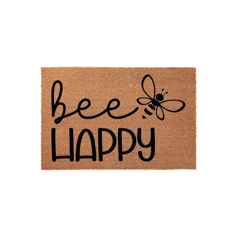 Bee Happy coir doormat featuring a natural brown fiber texture with black printed text and a cute bumblebee graphic, creating a cheerful and welcoming entrance decor piece for your front porch or home entryway on a plain white