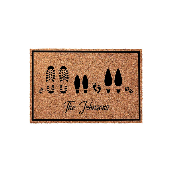 Personalized family doormat featuring a natural coir texture with black printed footprints of adults, children, and pet paws, centered with a custom family name in elegant script on a clean white background for a welcoming home