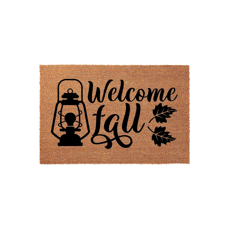 Welcome Fall coir doormat featuring a black printed design of a rustic lantern and autumn leaves on a natural brown fiber background, creating a festive seasonal entryway decoration for your front porch or home entrance decor.