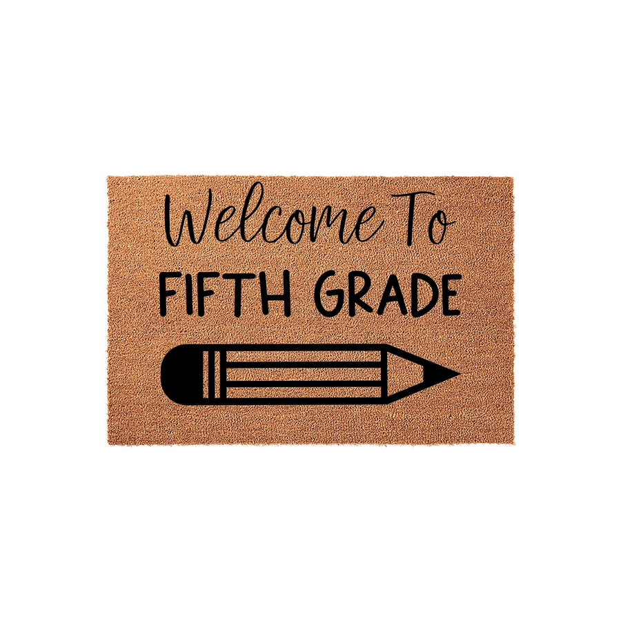 Welcome To Fifth Grade classroom doormat featuring a natural coir texture with bold black text and a pencil graphic, making a fun and inviting entrance decoration for a teacher's classroom door or a school entryway during the