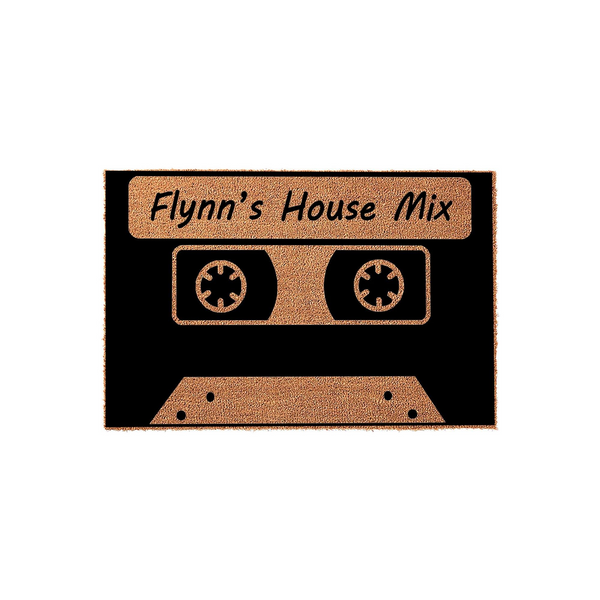 Personalized Cassette Tape Doormat featuring a retro music design on a natural coir fiber mat, with custom text printed in a bold black font against the textured tan background for a nostalgic home entrance decor piece.