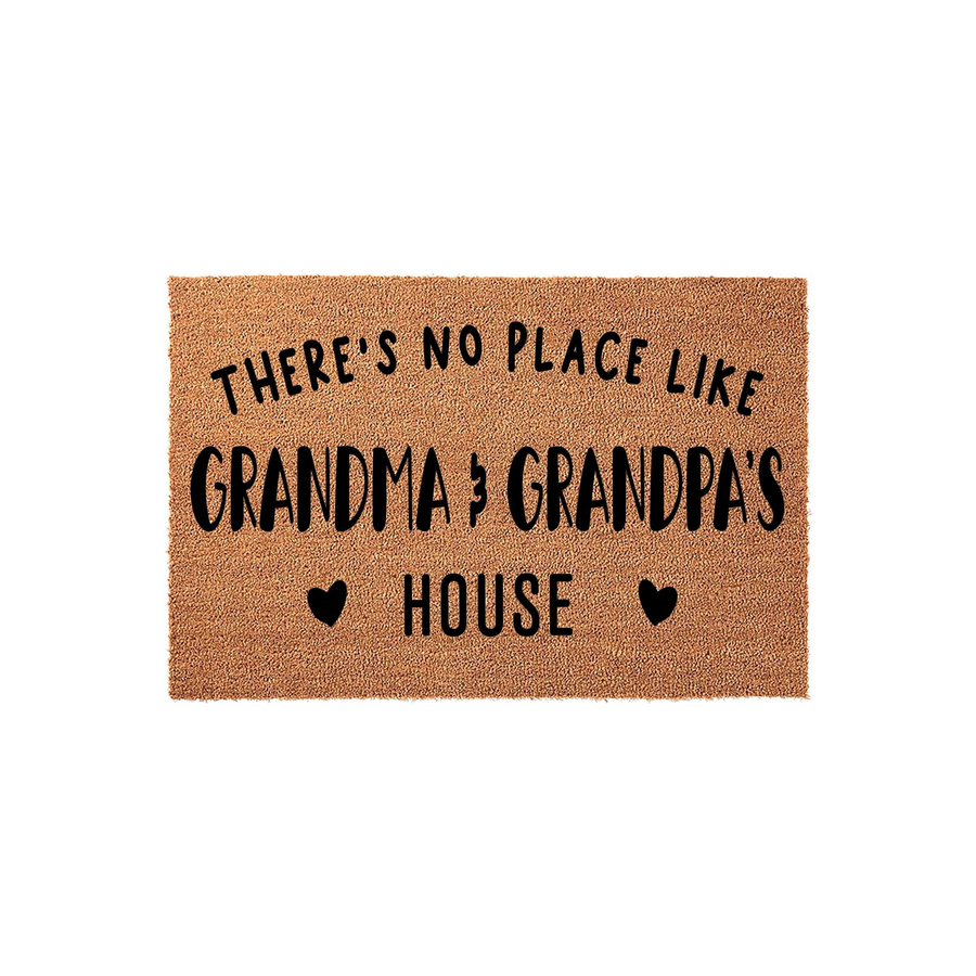 Grandma and Grandpa house doormat made of natural coir fiber with a clean white background, featuring bold black text that reads There is no place like Grandma and Grandpa's house with two small heart icons on the bottom row.