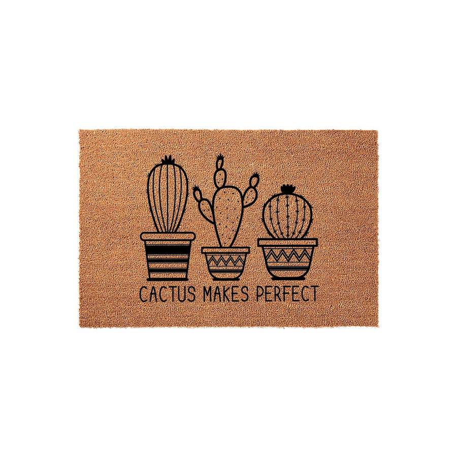 Cactus Makes Perfect coir doormat featuring a black line art illustration of three potted cacti in decorative planters, set against a natural brown textured background for a charming and welcoming front porch entryway decor.