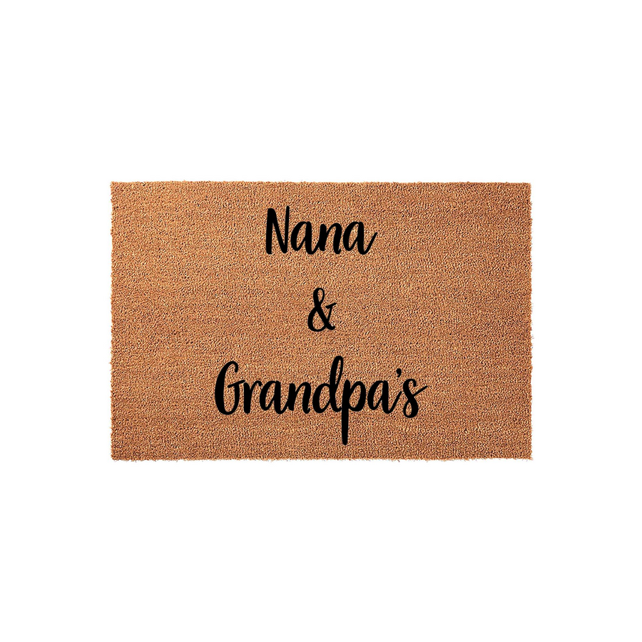Nana and Grandpa's personalized coir doormat features a natural tan fiber texture with elegant black script lettering, creating a warm and welcoming entrance for a grandparent's home on a clean, solid white studio background.