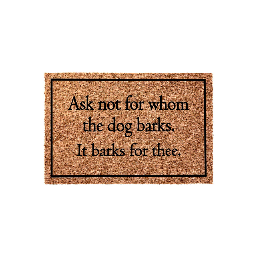 Funny Dog Lover Doormat featuring a natural coir texture and a black border, printed with the humorous quote Ask not for whom the dog barks, it barks for thee, making it a clever entryway decor piece for any pet owner's home.