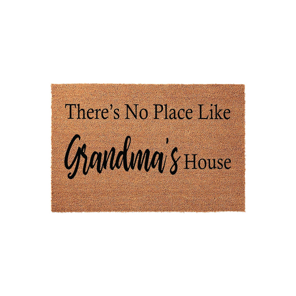 Grandma's House coir doormat featuring a natural brown fiber texture and bold black lettering that reads There's No Place Like Grandma's House, presented against a clean white background for a classic entryway decor look.