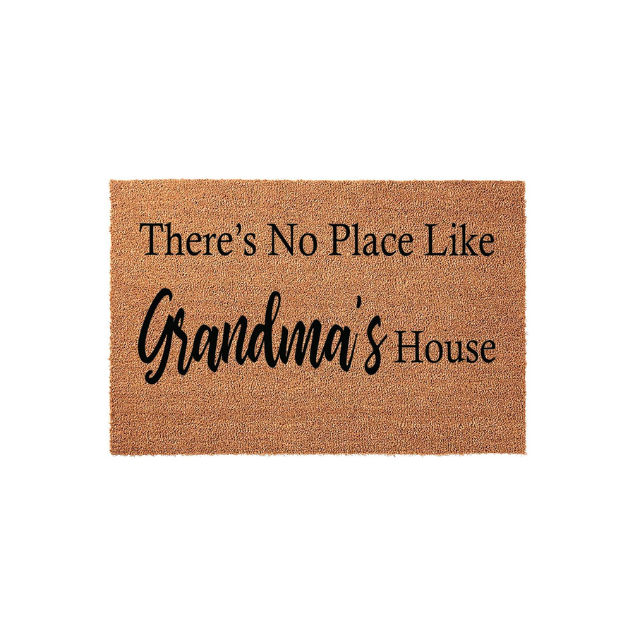 Grandma's House coir doormat featuring a natural brown fiber texture and bold black lettering that reads There's No Place Like Grandma's House, presented against a clean white background for a classic entryway decor look.