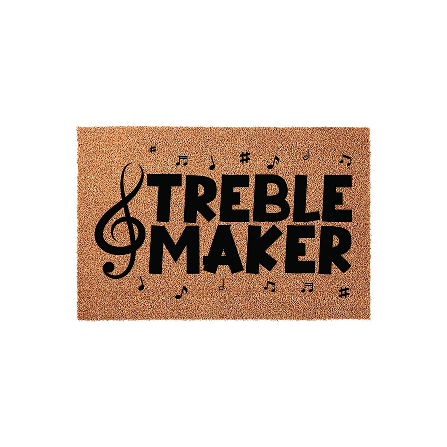 Treble Maker music doormat featuring a natural coir fiber texture with bold black text and musical notes printed across the surface, creating a fun and welcoming entrance for any musician or music lover's home on a plain white