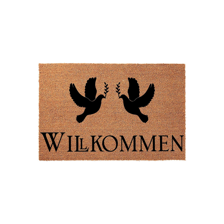 Wilkommen Dove Welcome Doormat made of natural coir fiber, featuring two black silhouettes of flying doves carrying olive branches above the German word for welcome, set against a plain white studio background for a clean