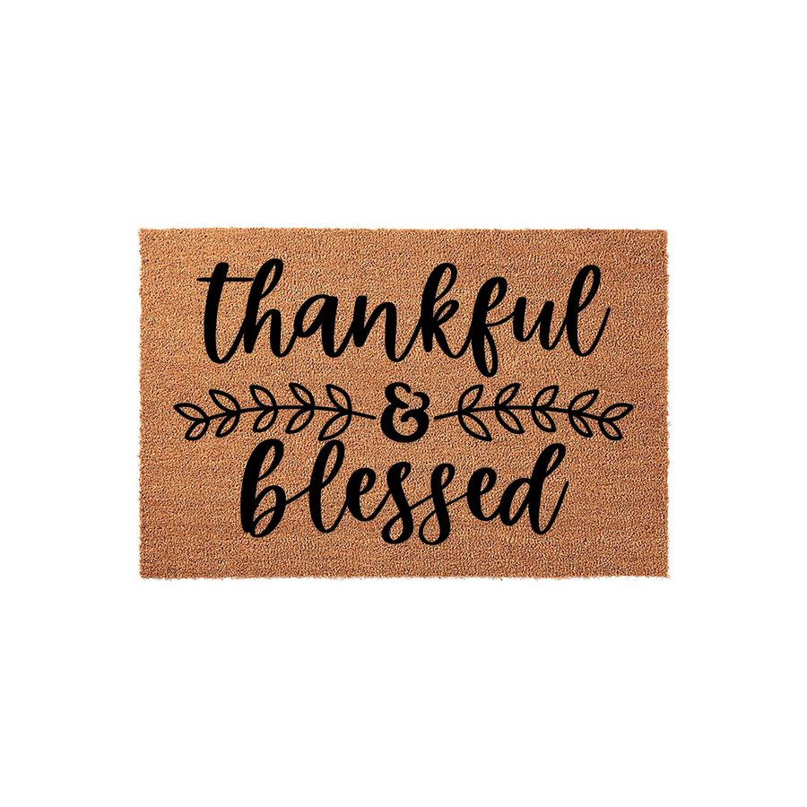 Thankful and Blessed coir doormat featuring a natural brown fiber texture with black script lettering and a decorative leaf branch design in the center, creating a welcoming farmhouse style entrance for your front porch decor.