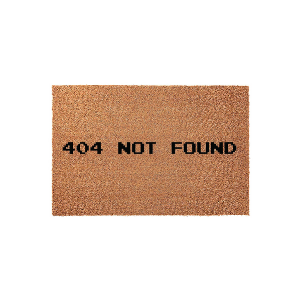 404 Not Found Doormat featuring a humorous computer error message printed in bold black pixelated font on a natural brown coir fiber mat, displayed against a clean white background for a modern tech-inspired home entryway decor.