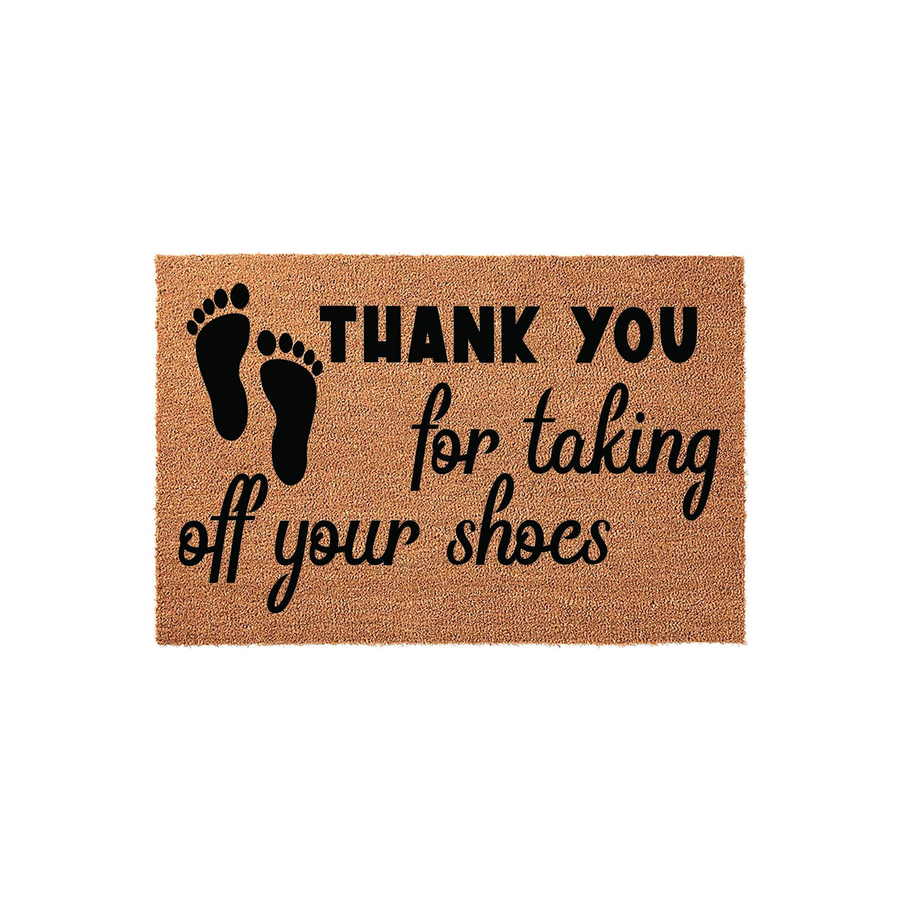 Thank You For Taking Off Your Shoes coir doormat featuring a pair of black footprints on the left side and bold, elegant black typography on a natural brown fiber background, creating a welcoming entryway decor piece for your
