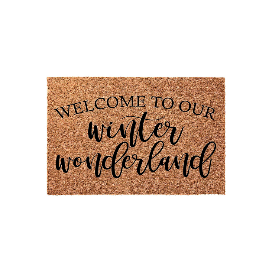 Welcome to our winter wonderland coir doormat featuring a natural brown fiber texture and elegant black typography, making it a festive seasonal entryway rug for your home decor during the cold holiday months and snowy winter