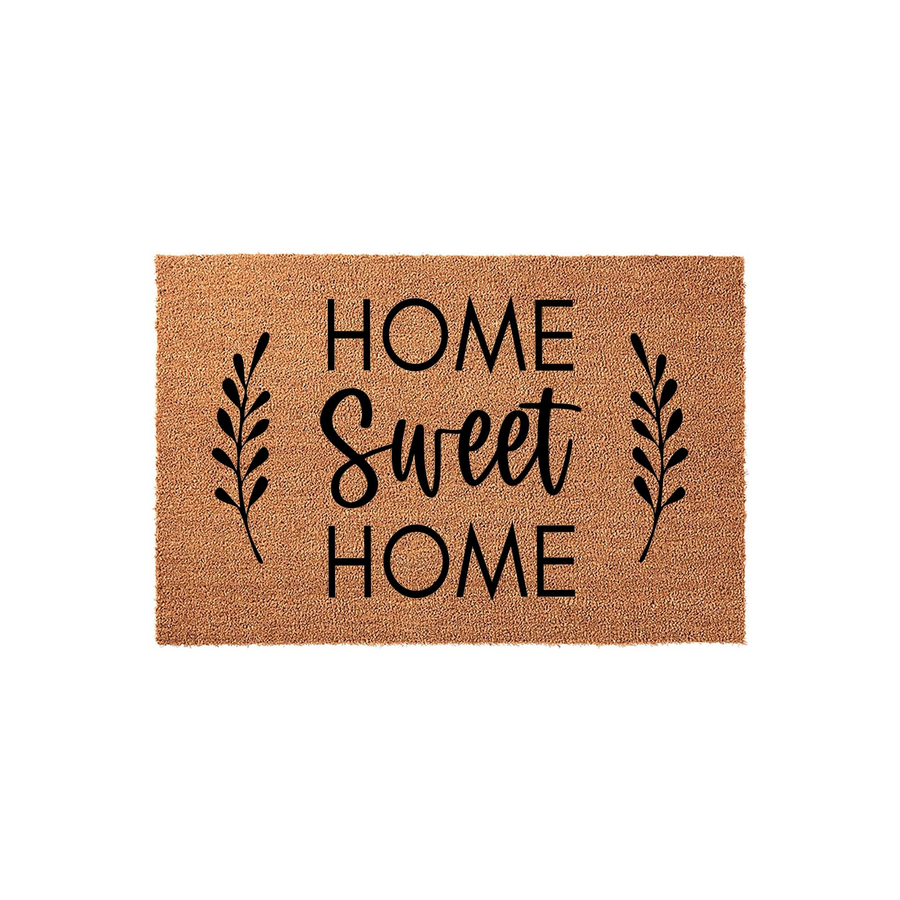 Home Sweet Home coir doormat featuring a natural tan fiber texture with black printed text and elegant leaf sprigs on either side, creating a welcoming farmhouse aesthetic for your front porch entrance or entryway floor decor.