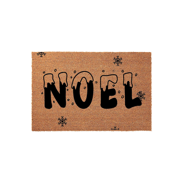Noel Christmas doormat made of natural coir fiber, featuring bold black lettering with a snowy drip effect and small snowflake accents scattered across the rectangular mat against a clean white studio background.