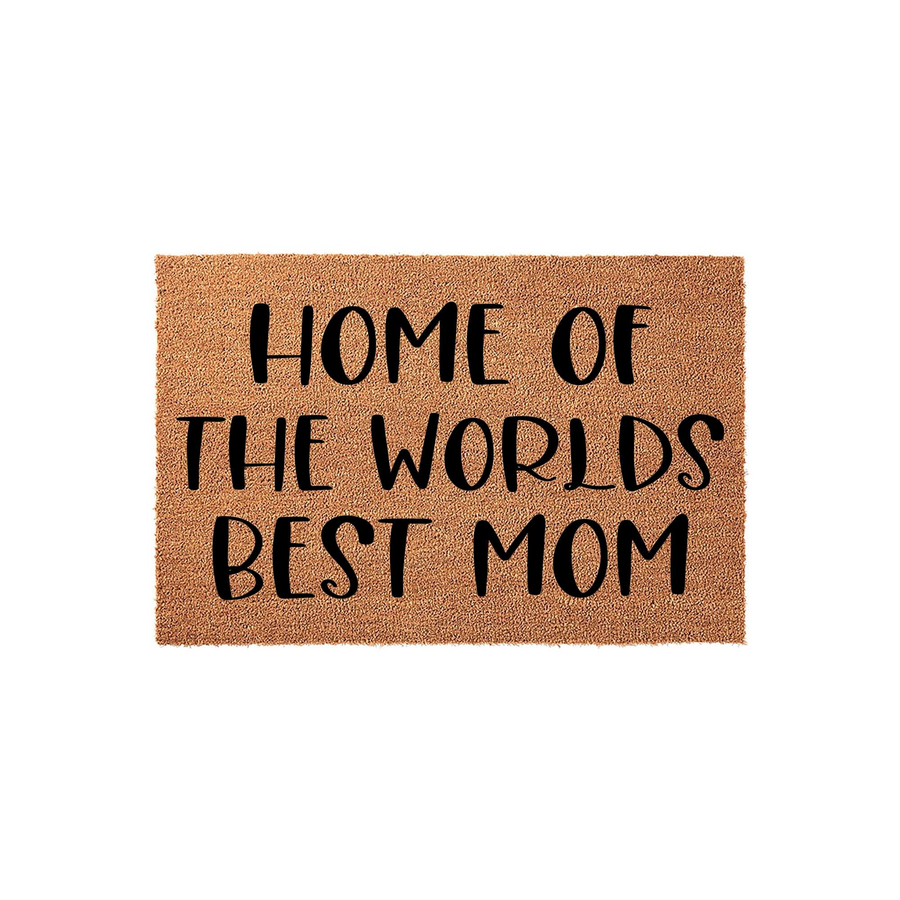 Worlds Best Mom coir doormat featuring a natural brown fiber texture and bold black lettering that reads Home of the Worlds Best Mom, presented on a clean white background for a simple and welcoming front porch entryway decor